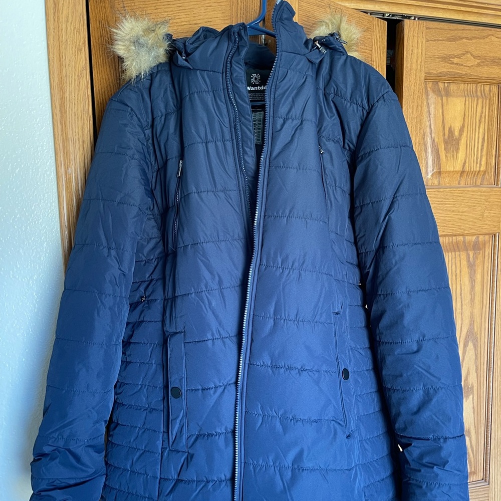Winter coat, with faux fur lined hood.